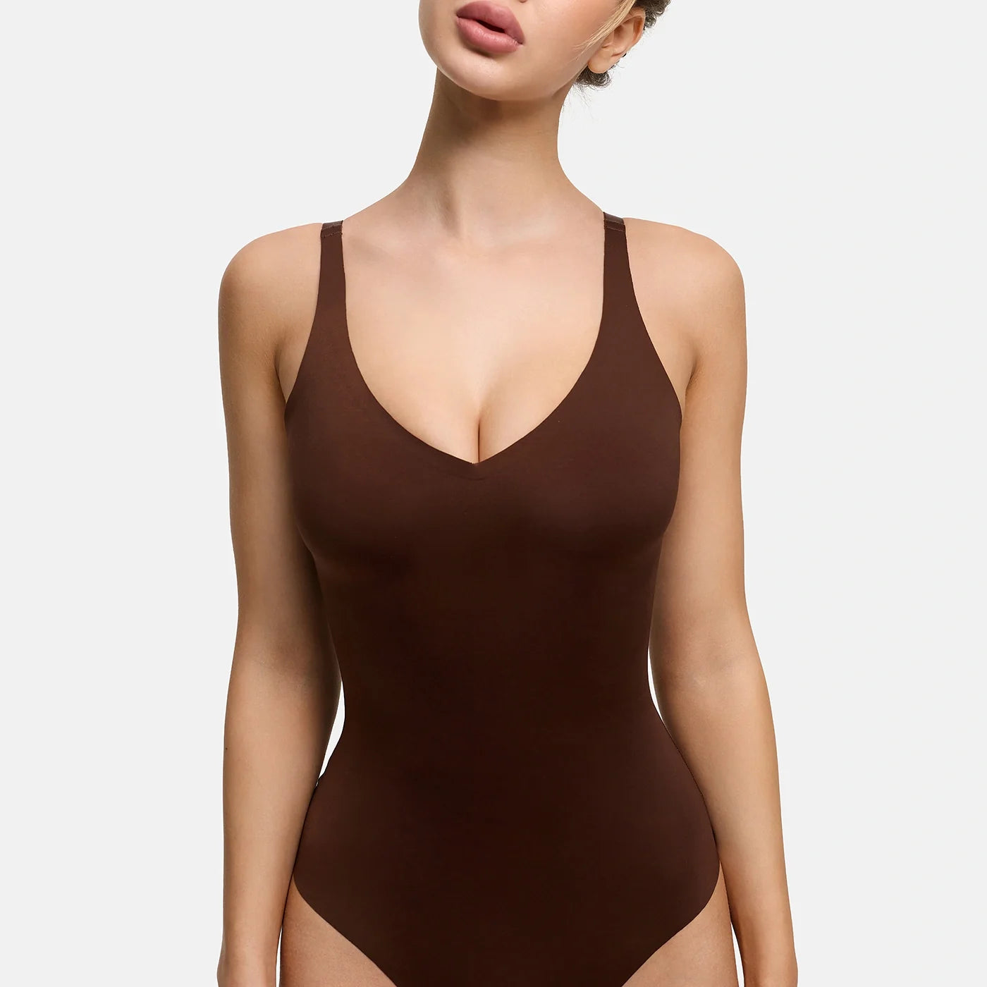 Glanzende shaping bodysuit met string