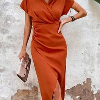 Oranje midi jurk met v-hals – Ruby