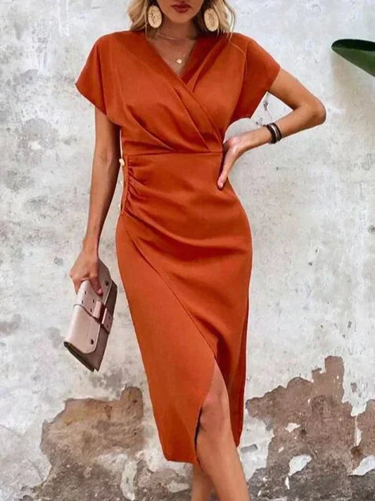 Oranje midi jurk met v-hals – Ruby