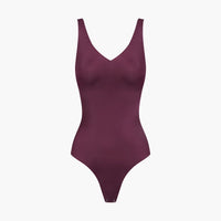Glanzende shaping bodysuit met string