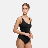 Glanzende shaping bodysuit met string