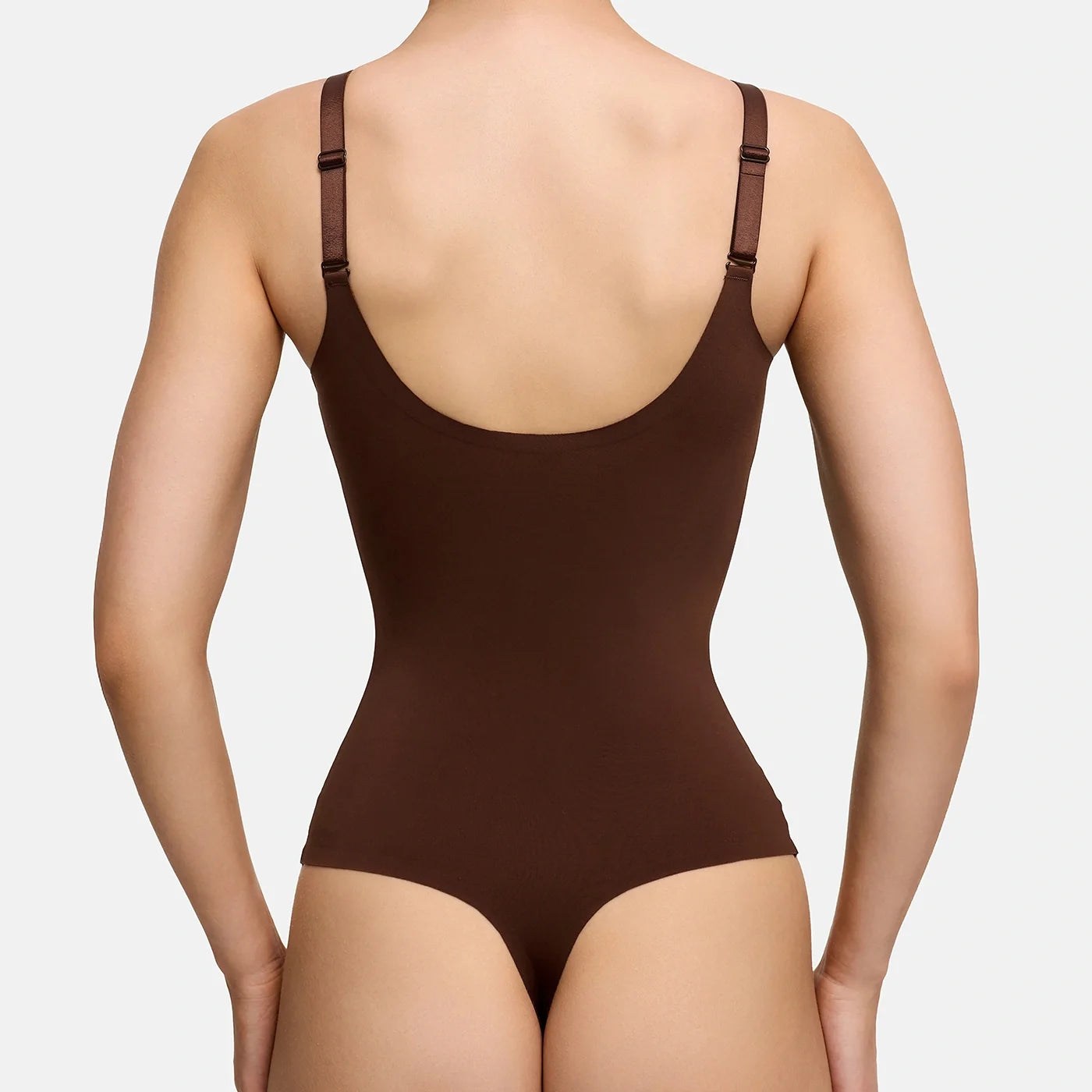 Glanzende shaping bodysuit met string