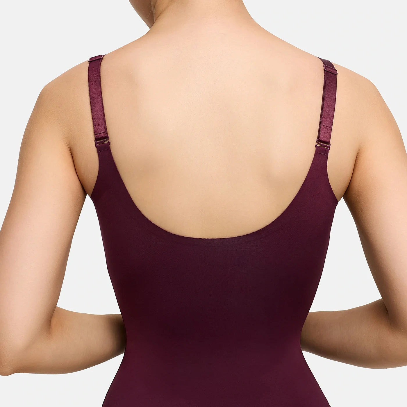 Glanzende shaping bodysuit met string