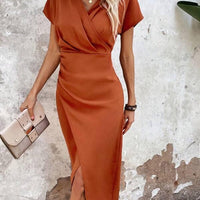 Oranje midi jurk met v-hals – Ruby