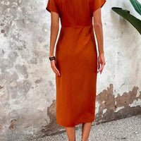 Oranje midi jurk met v-hals – Ruby