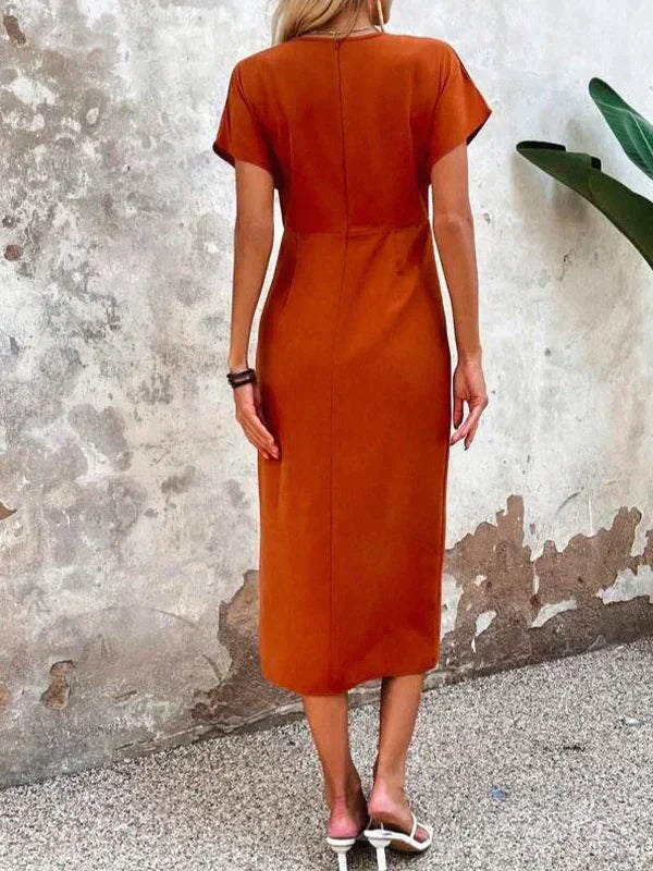 Oranje midi jurk met v-hals – Ruby